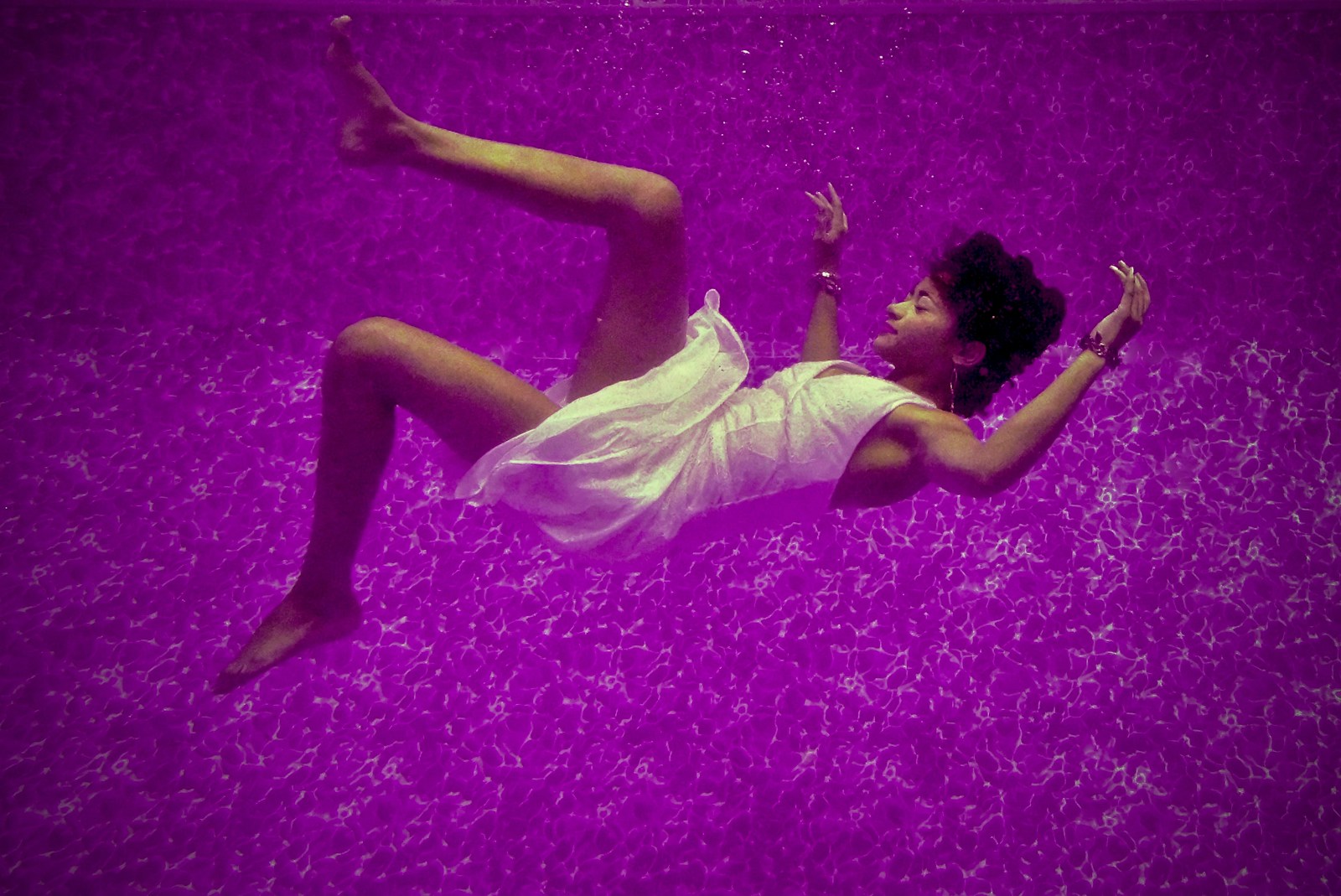 woman falls on purple surface are vivid dreams a sign of mental illness