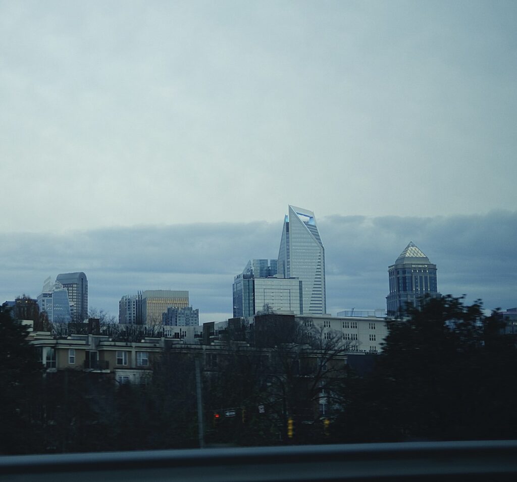 a view of a city from a moving vehicle