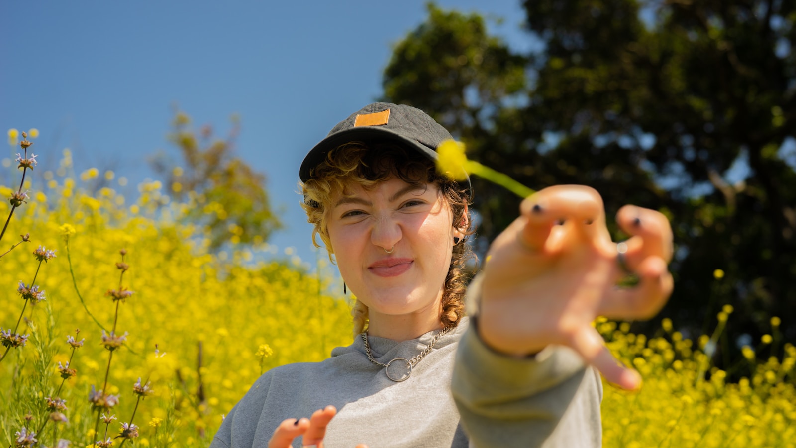 Photo by Hiki App Portrait of a nonbinary autistic person outdoors ADHD