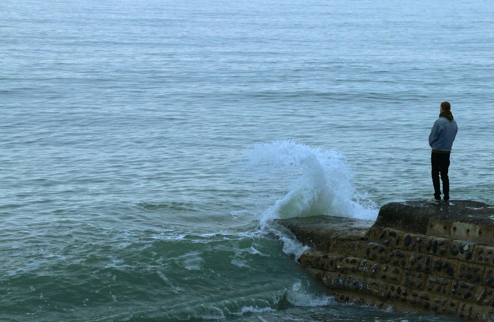 brown rock formation on sea during daytime ptsd