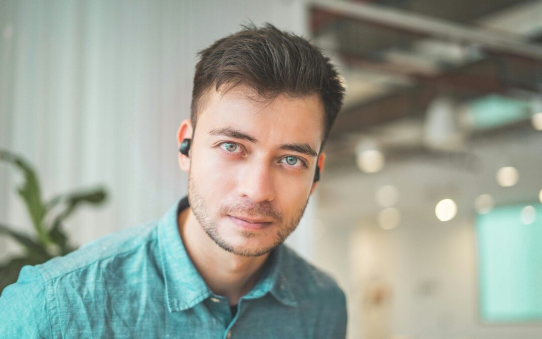 man wearing green collared top Career Counseling