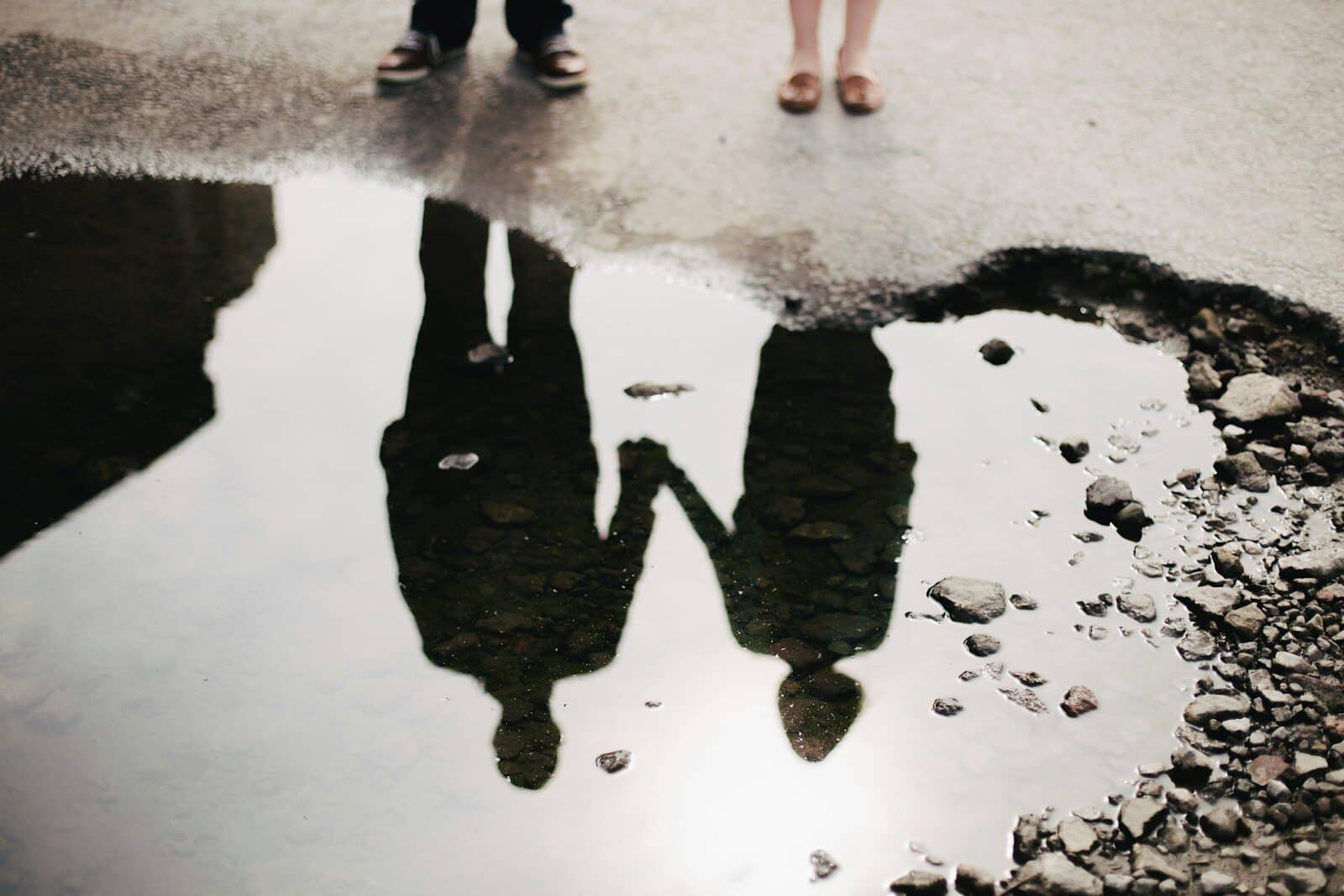 man and woman holding hand together Interpersonal Relationships and the Emotional Connection We All Need