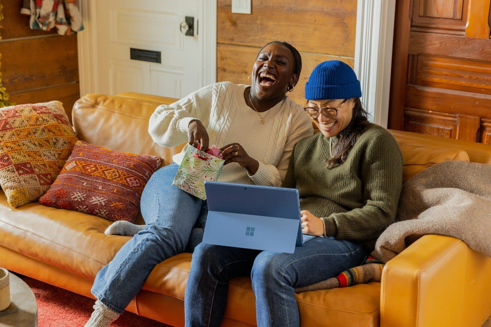 a person sitting on a couch with a laptop DBT Emotion Regulation Skills for a More Steady, Grounded Life