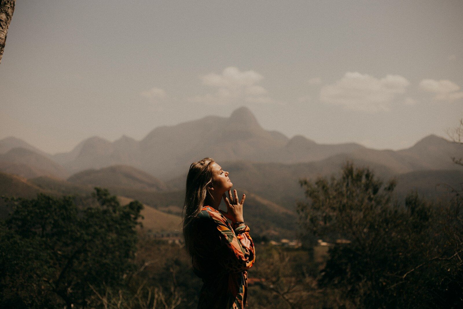woman in black jacket standing on green grass field during daytime The Radical Acceptance DBT Skill: What It Is and Why It Matters