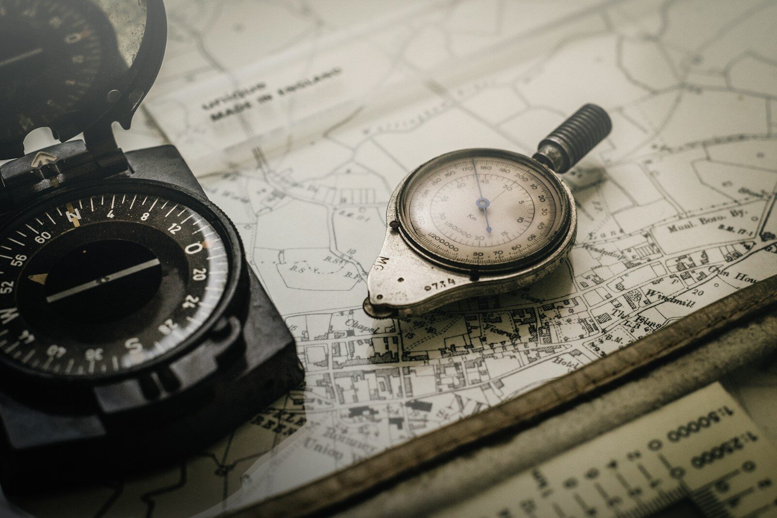 black and gray compass on top of map Mental Health Activities for Men: Building Resilience and Connection