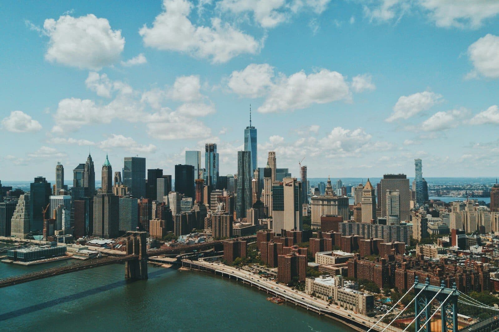 The Manhattan skyline and Brooklyn Bridge over the East River in New York Navigating Burnout: Why Every Executive Officer Should Consider Therapy for Clarity and Balance